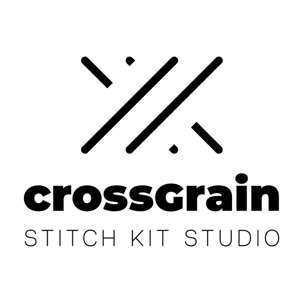 Crossgrain Stitch Kit Studio in block letters. A cross stitch pattern above the words. Black and grey on a white background.